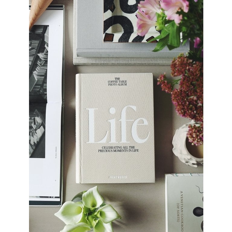 Printworks life fotoboek tussen boeken