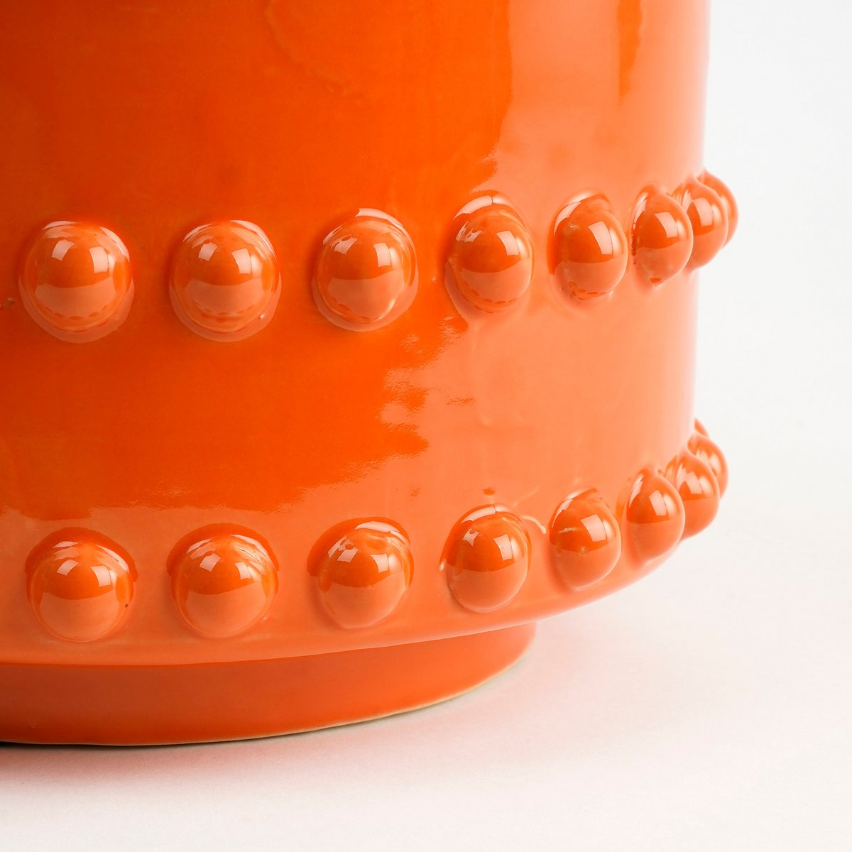 Oranje bloempot keramiek onderkant