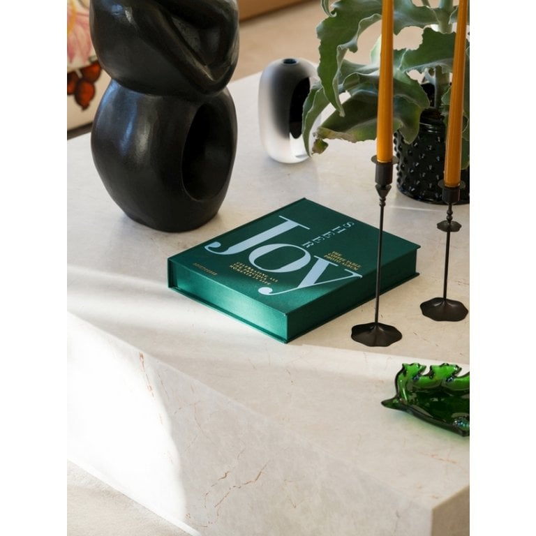 Groen fotoalbum printworks op tafel
