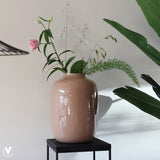 Beige vaas met takken