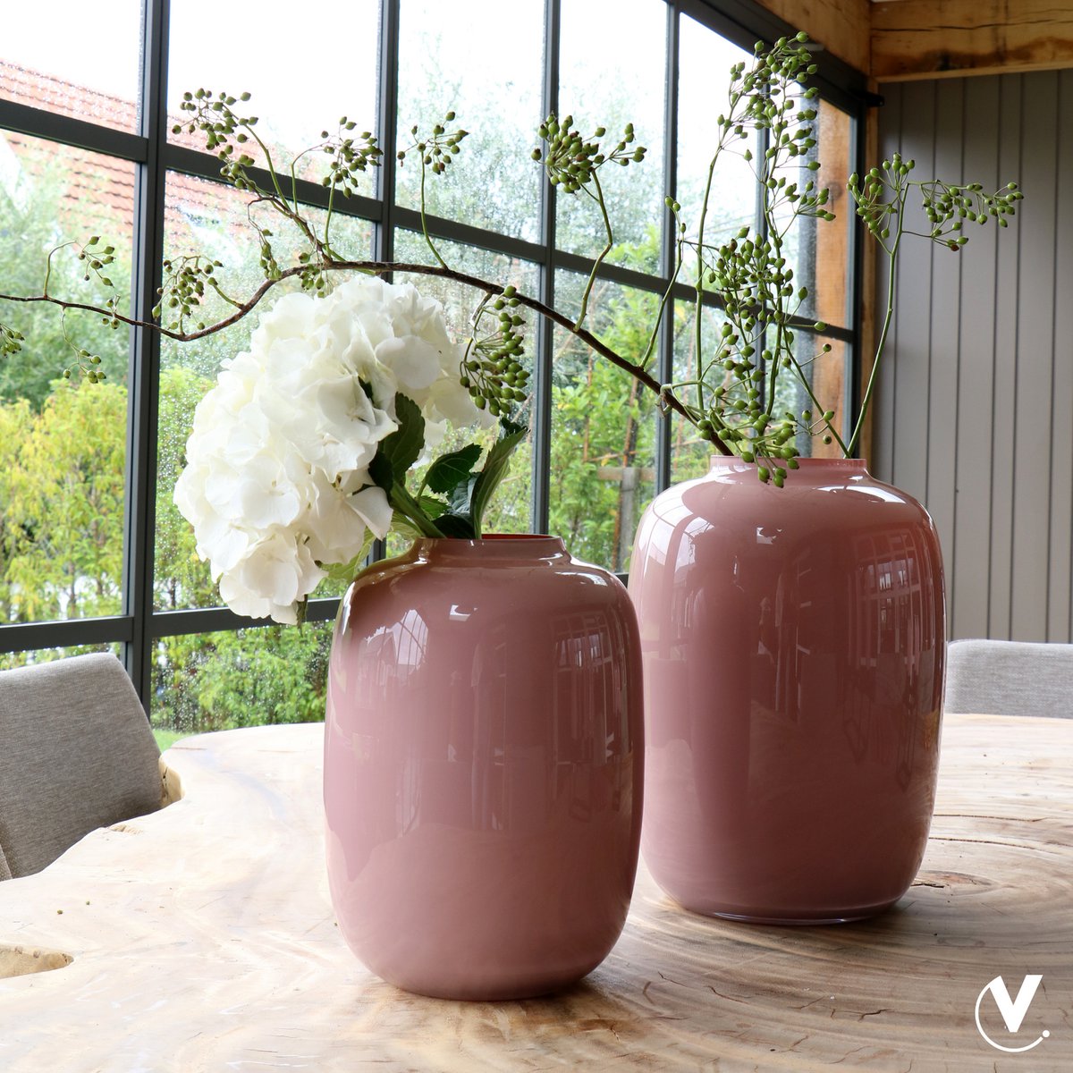 Pastel roze vaas met takken