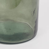 Groene glazen flesvaas onderkant