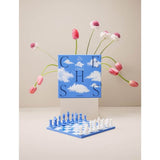 schaakbord met wolken met bloemen