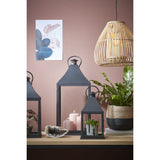 Plantenmand zwart riet op tafel