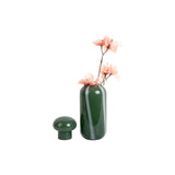 Glazen vaasje met bloem