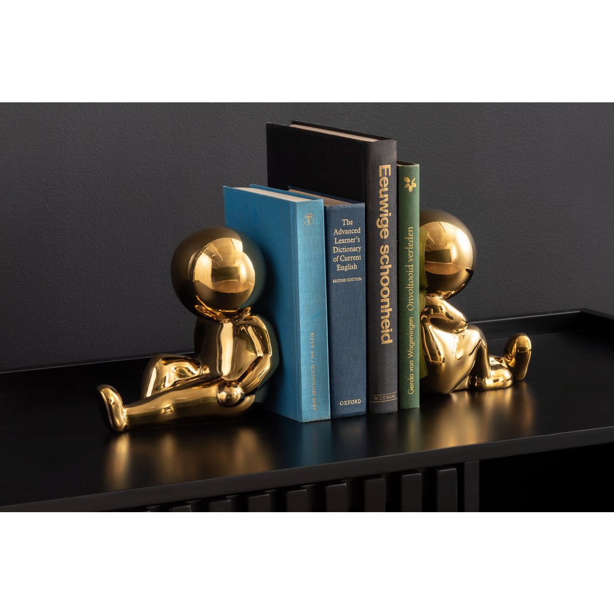Boekensteun astronaut goud met boeken