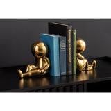 Boekensteun astronaut goud met boeken
