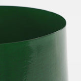 Groene metalen bloempot bovenkant