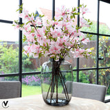 Glazen vaas met kleurverloop met bloemen